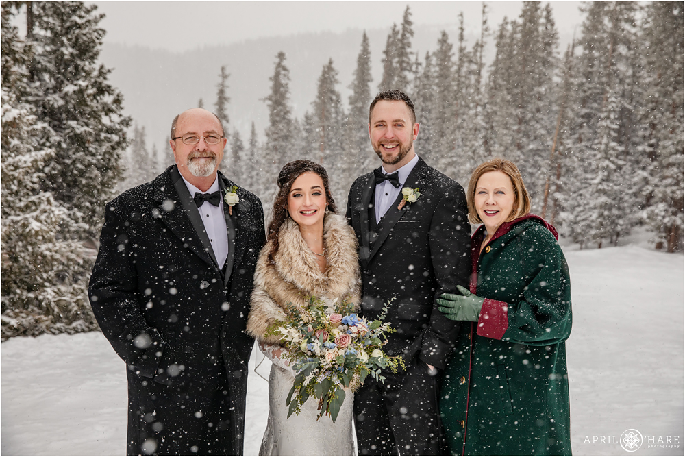 Outdoor family pictures at a Destination wedding during winter in Colorado Keystone Resort