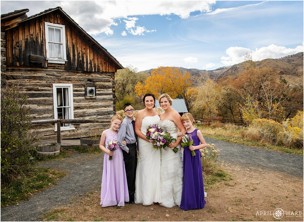 A blended family portrait for a same sex couple on their wedding day in Golden Colorado