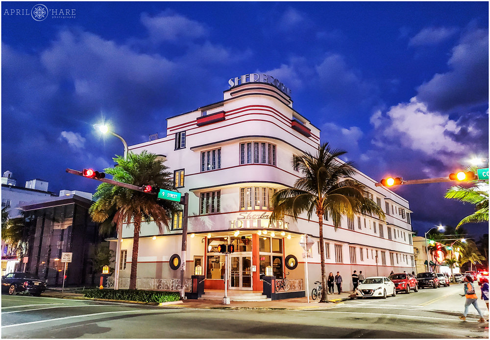 Art Deco Sherbrooke Hotel at dusk with blue sky and glowing lights in South Beach Miami Florida 