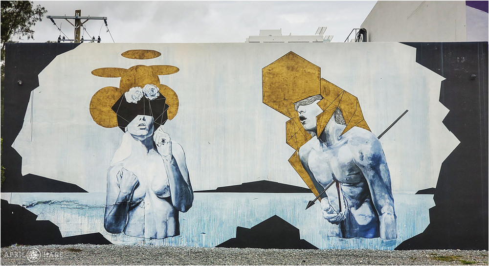 Gold shapes with B&W paintings wall mural in Wynwood