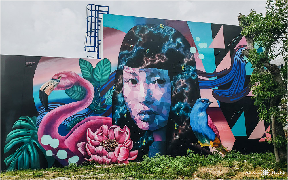 Gorgeous wall mural collaboration from DEIH, Slomo, Irene Lopez Leon, and Uri Martinez in the Wynwood neighborhood of Miami