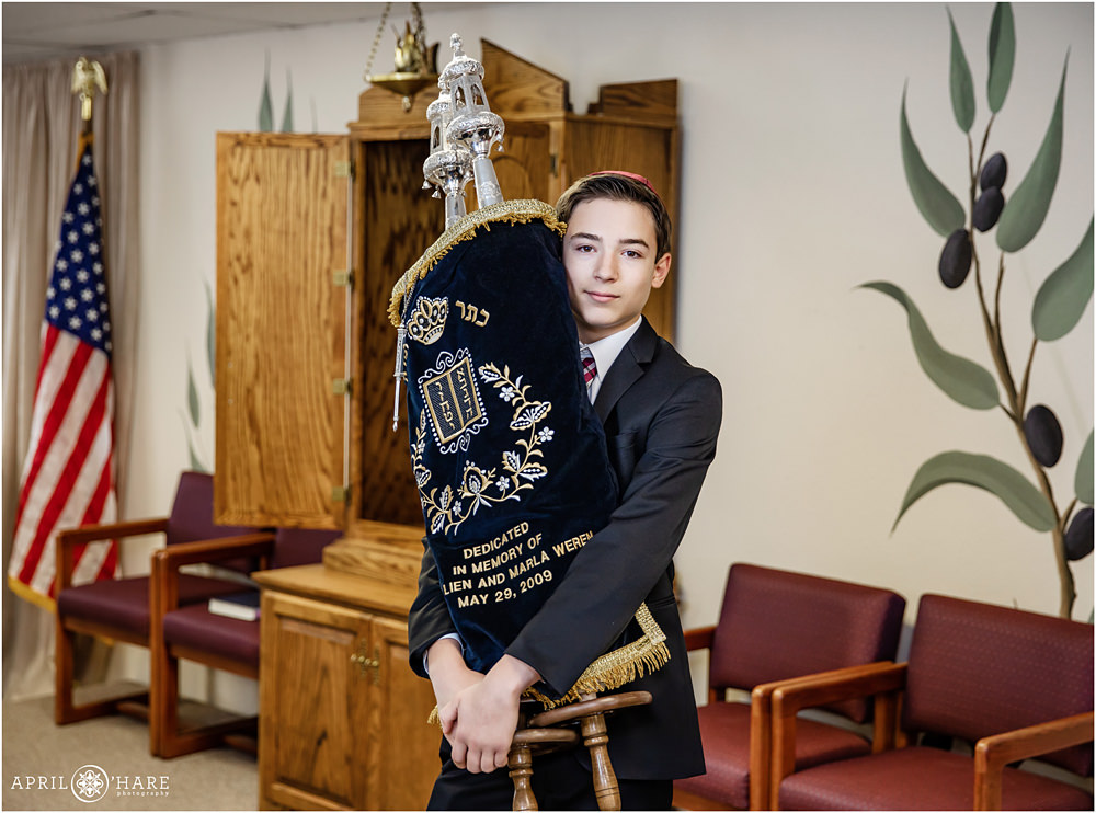 Bar Mitzvah Boy poses with Torah at B'nai Chaim