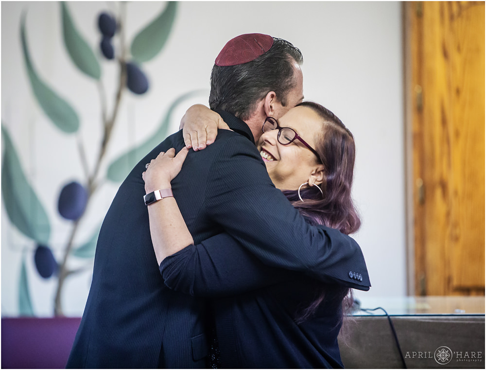 Family hugs prior to Bar Mitzvah at B'Nai Chaim in Morrison Colorado