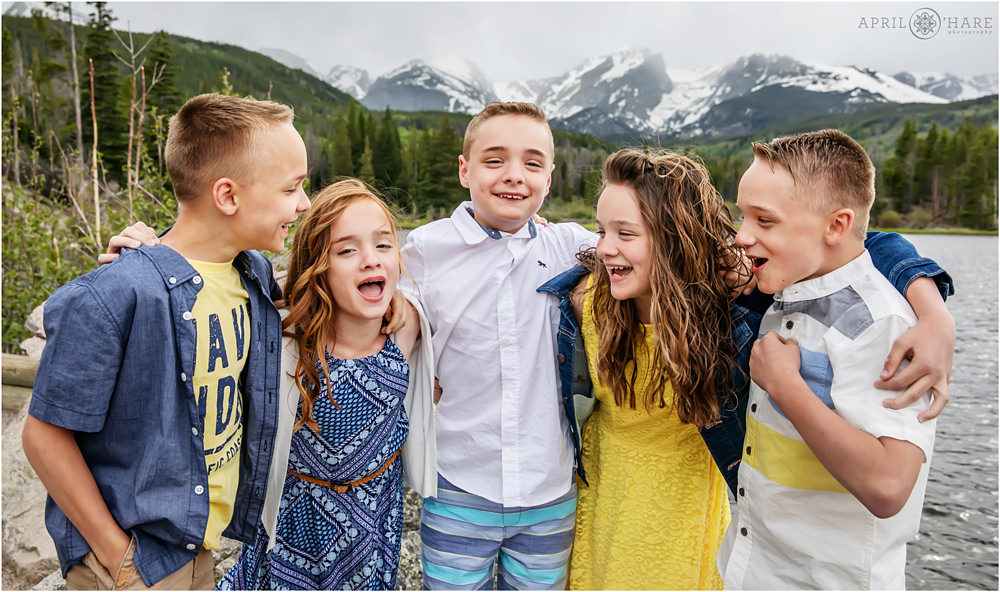 Quints laugh together at their Rocky Mountain National Park Family Photos at Sprague Lake