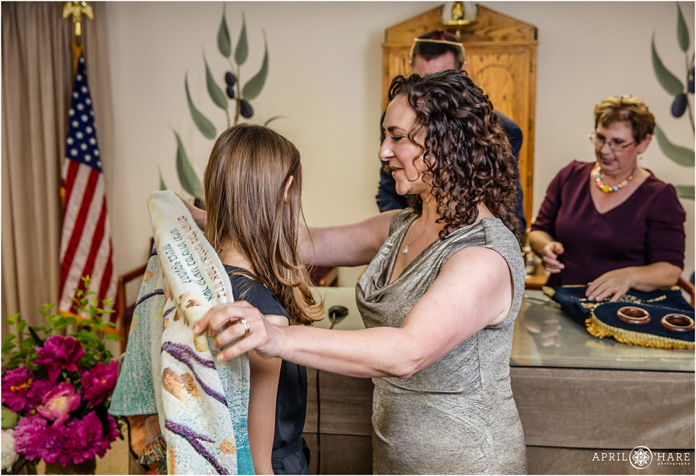 Mom helps her daughter put her Tallit on prior to bat mitzvah photos at B'Nai Chaim