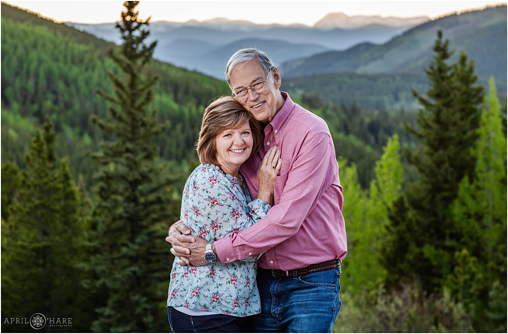 Evergreen Couples Photography with Pretty Blue Mountain Backdrop on Squaw Mountain Road