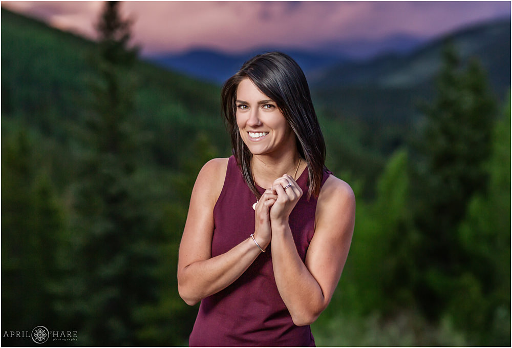 Cute Colorado personal branding photo during a stormy purple sunset