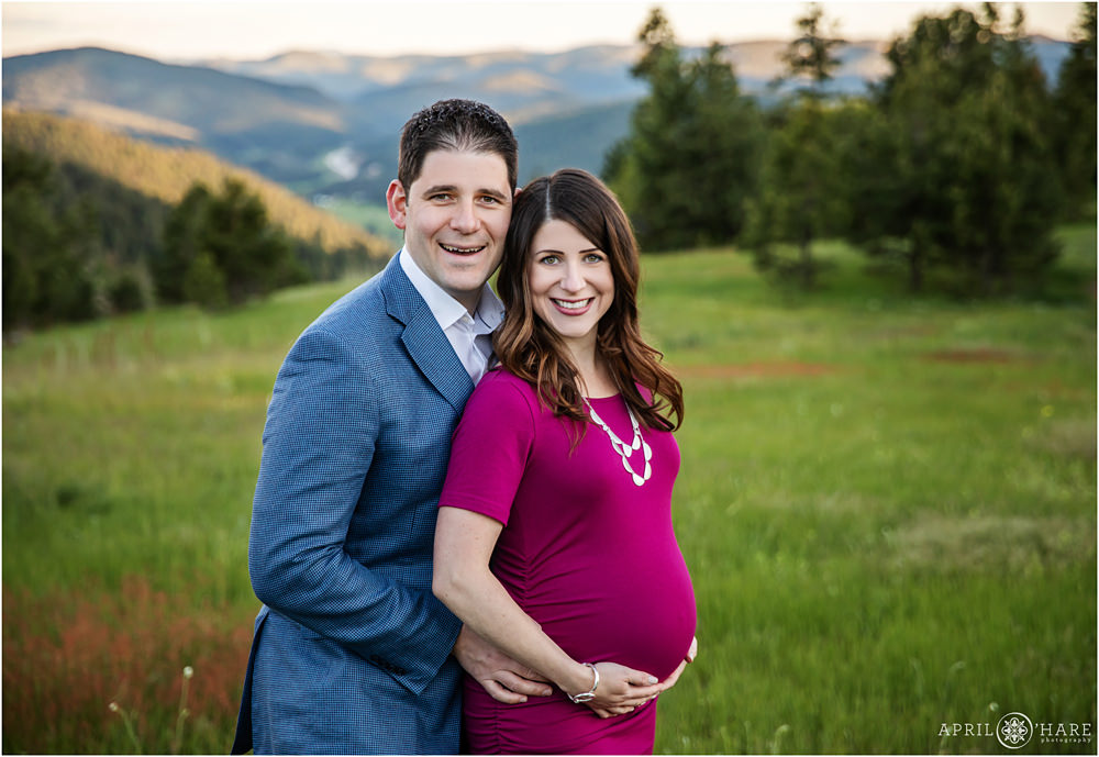 Classic Colorado Maternity Portraits with Mountain Backdrop at Mount Falcon in Evergreen