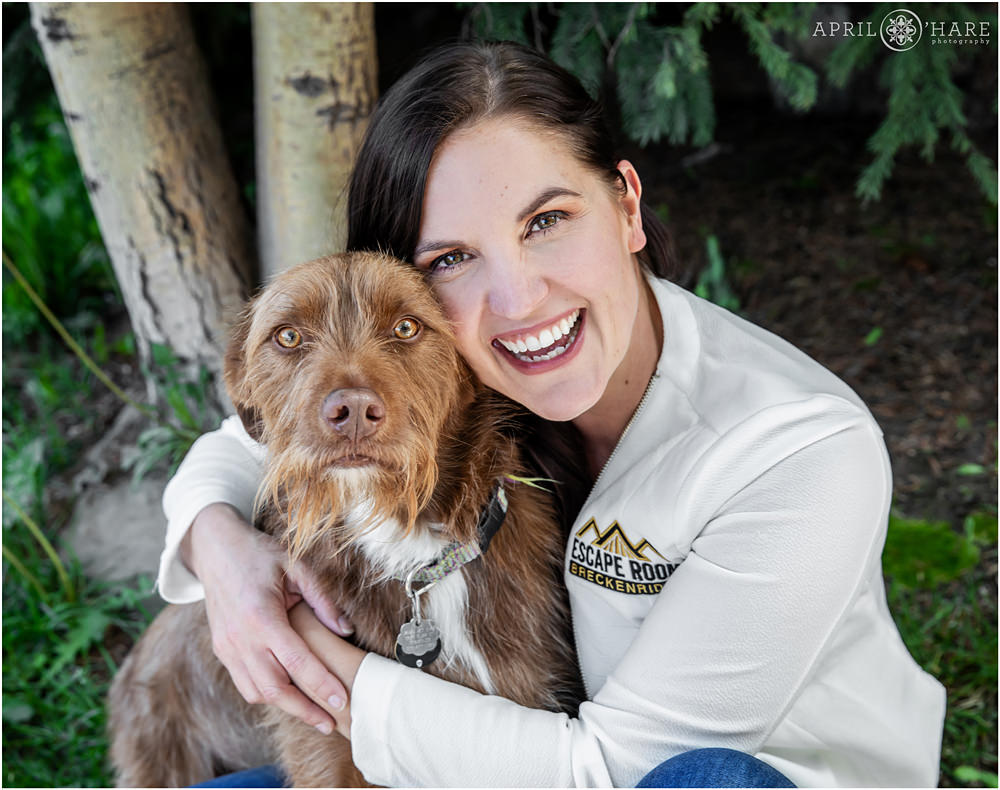 Colorado small business owner headshot portrait with her dog at Escape Room Breckenridge in CO