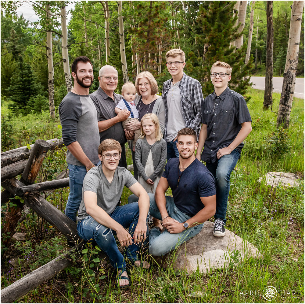 Denver extended family photographer poses grandparents with their grandkids for their 50th wedding anniversary