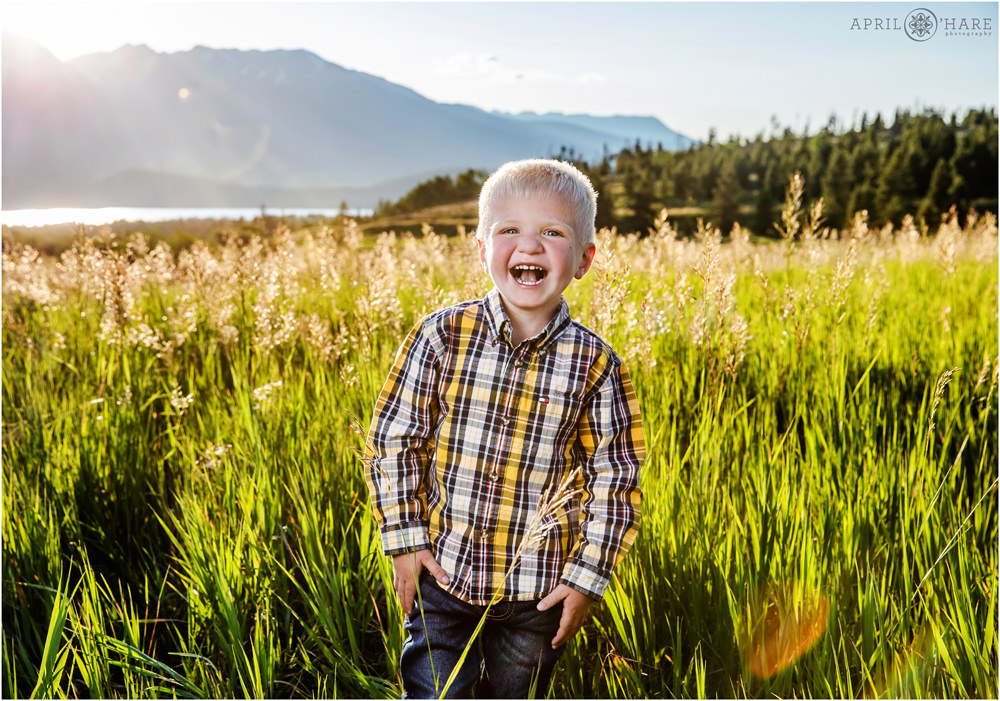 Cute kid laughs at his Colorado family session in Summit County