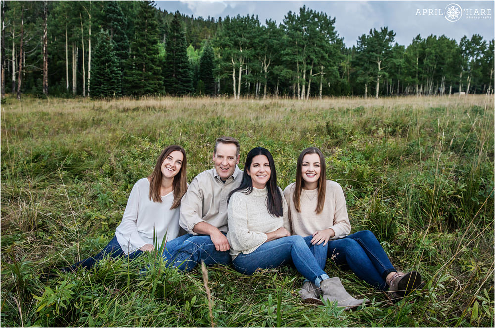 Beautiful family photo at a misty mountain family photography session at Beaver Brook Watershed Trail Head in Evergreen CO