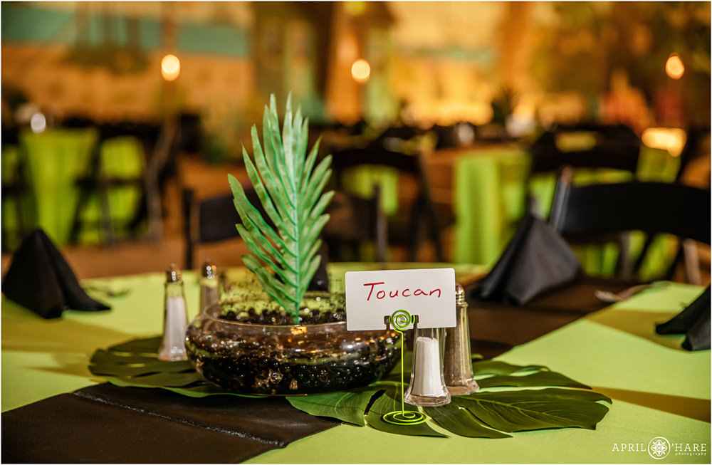Tropical island table centerpiece decor for a beach bar mitzvah party at The Island Event Center in Aurora