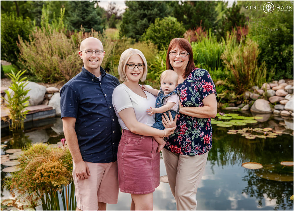 Pretty garden family photography with water garden pond backdrop