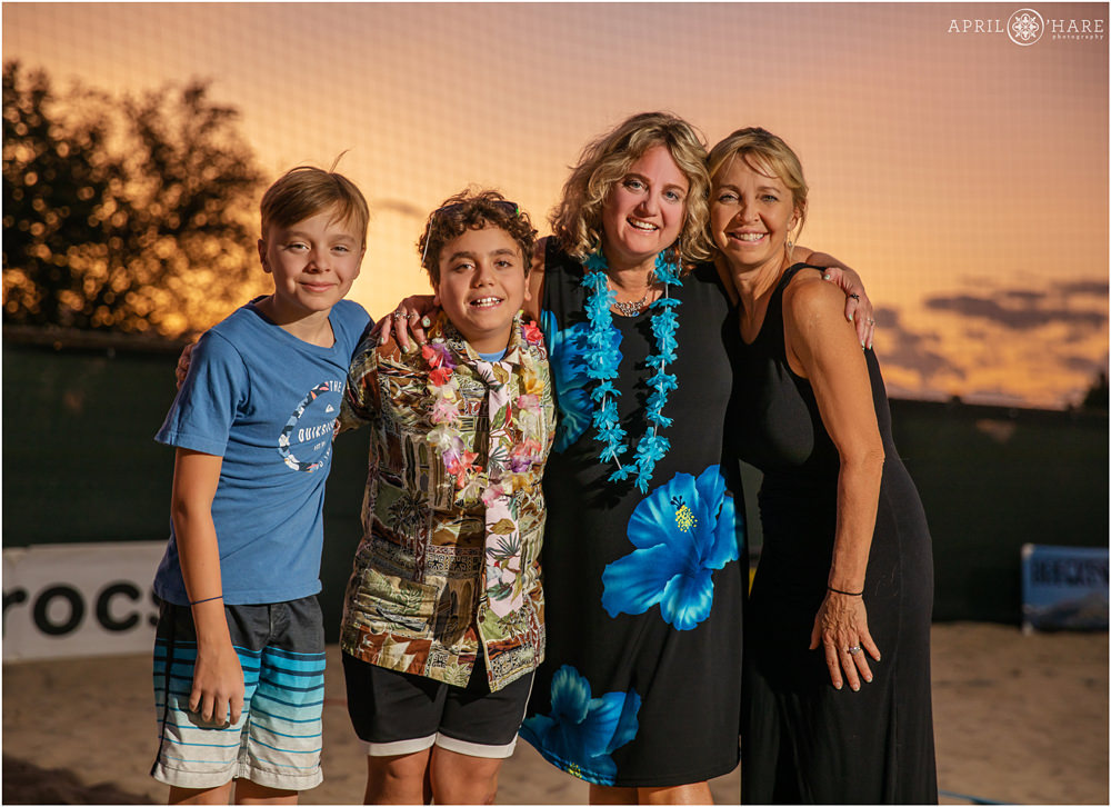 Posed portrait with friends at sunset at an island themed bar mitzvah party at The Island Event Center in Aurora