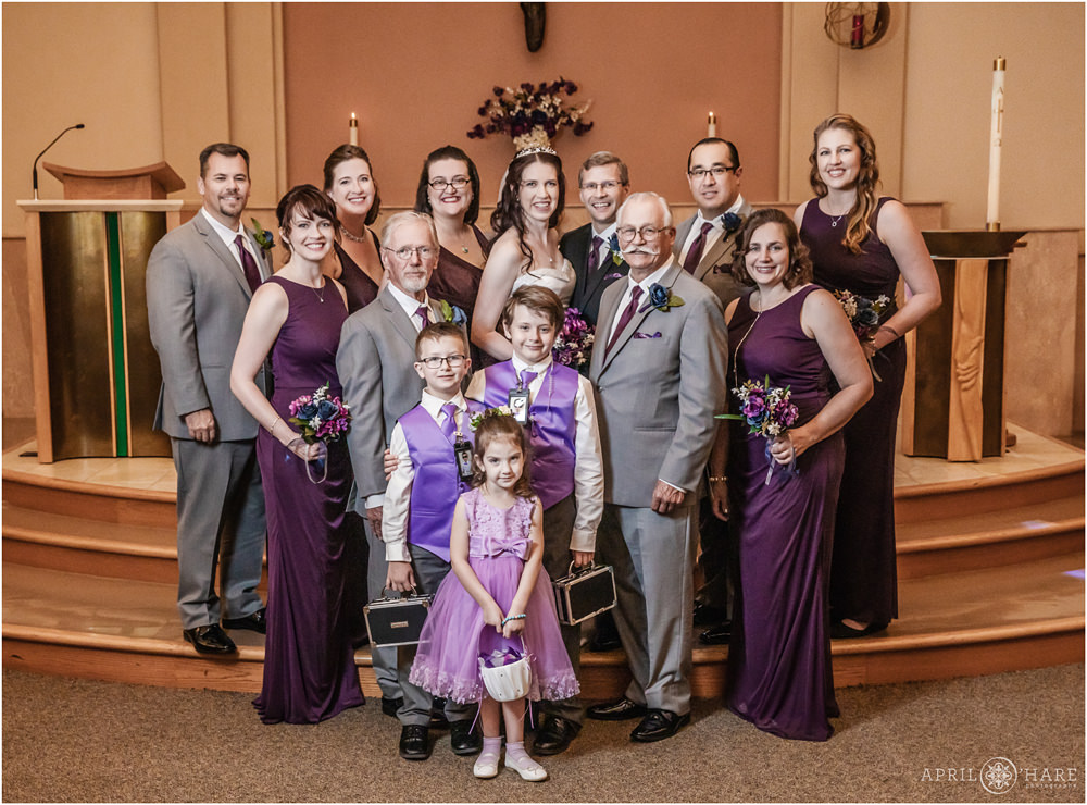 Classic Altar Formal Portrait with full wedding party at Our Father Lutheran Church in Centennial Colorado