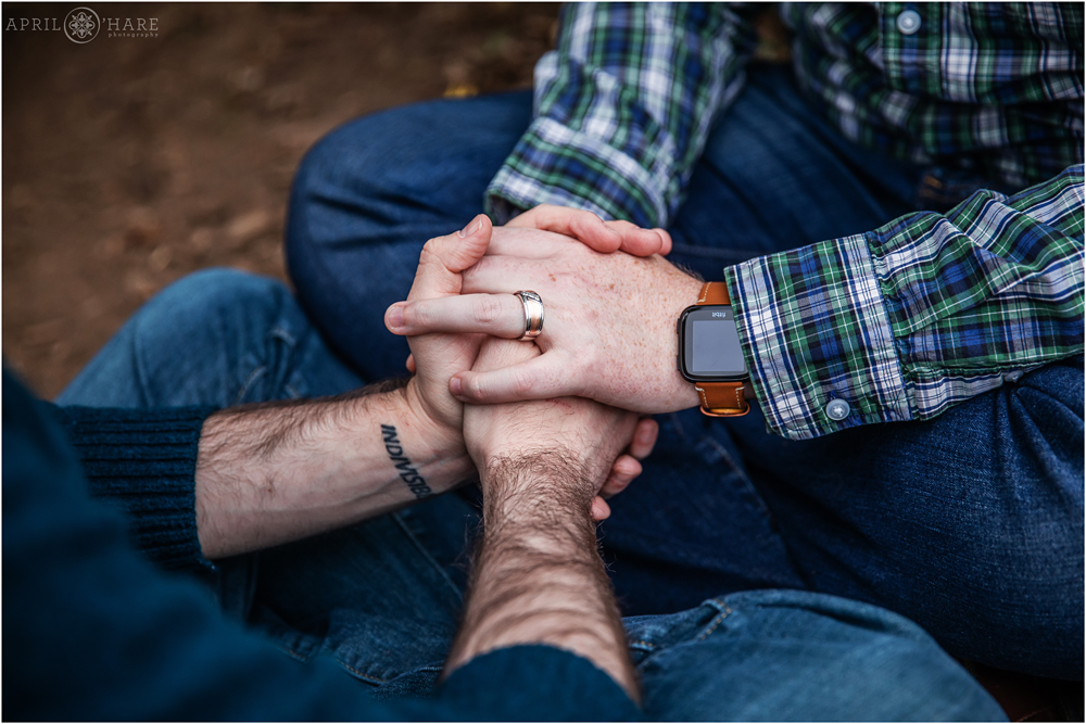 Romantic Colorado Gay Engagement Photography holding hands showing off the ring