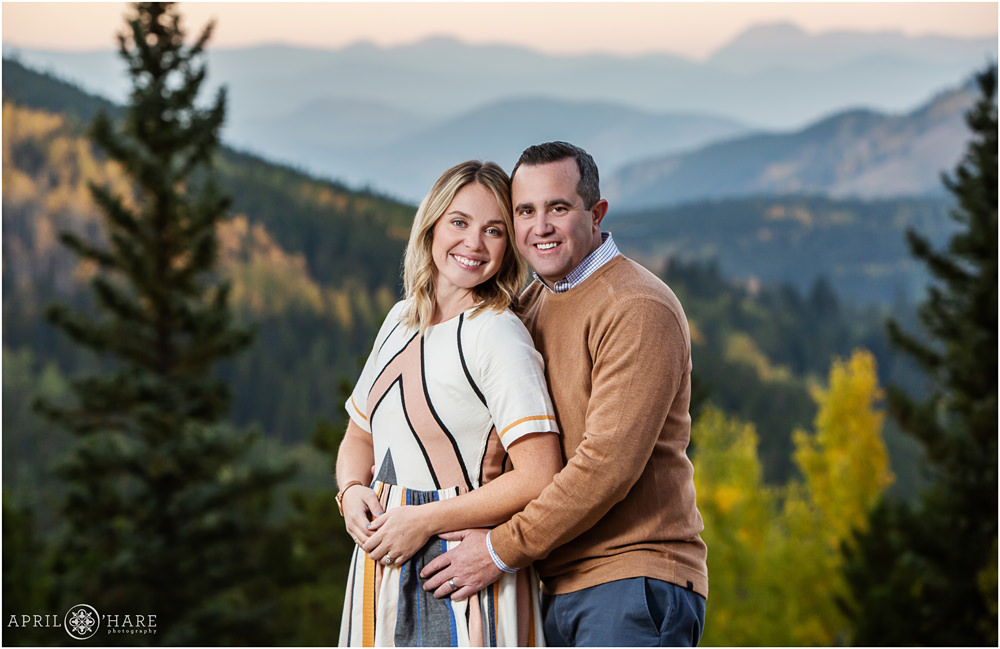 Mom and Dad couples portrait without kids in front of a gorgeous mountain backdrop in Evergreen Colorado