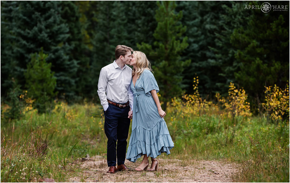 Romantic Colorado Engagement Photography in a forest during fall