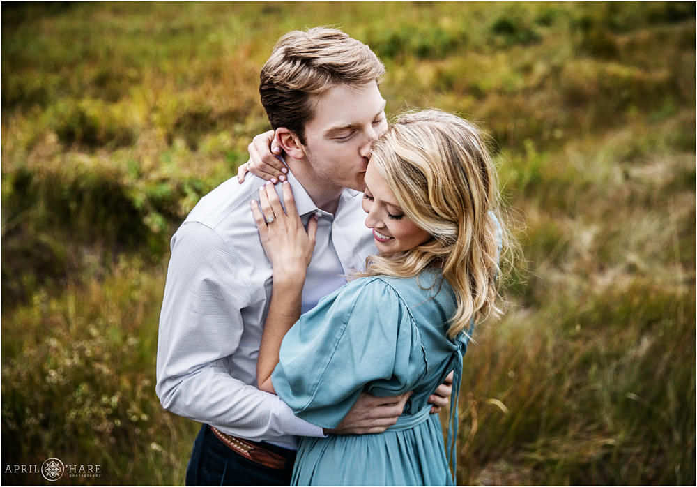 Romantic Colorado Engagement Photography in a mountain meadow