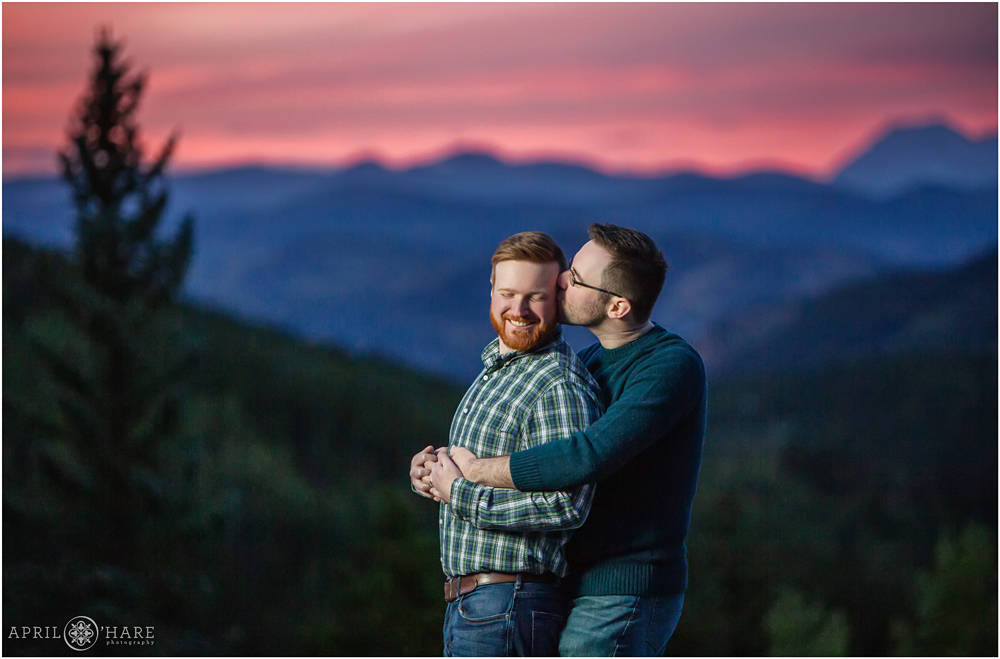 Beautiful Pink sunset sky from a Colorado gay engagement photography session on Squaw Pass Road