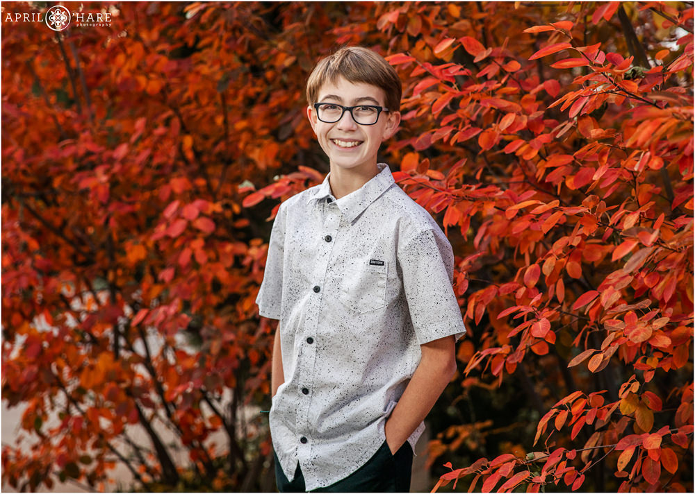 Beautiful fall color bar mitzvah portrait of a young man wearing a white button down shirt in Fort Collins Colorado