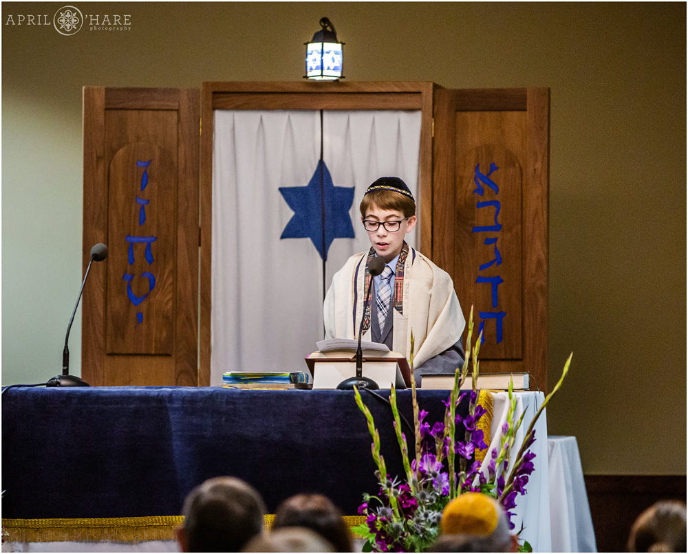 Young man gives a speech on the day of his bar mitzvah at The Lincoln Center in Fort Collins Colorado
