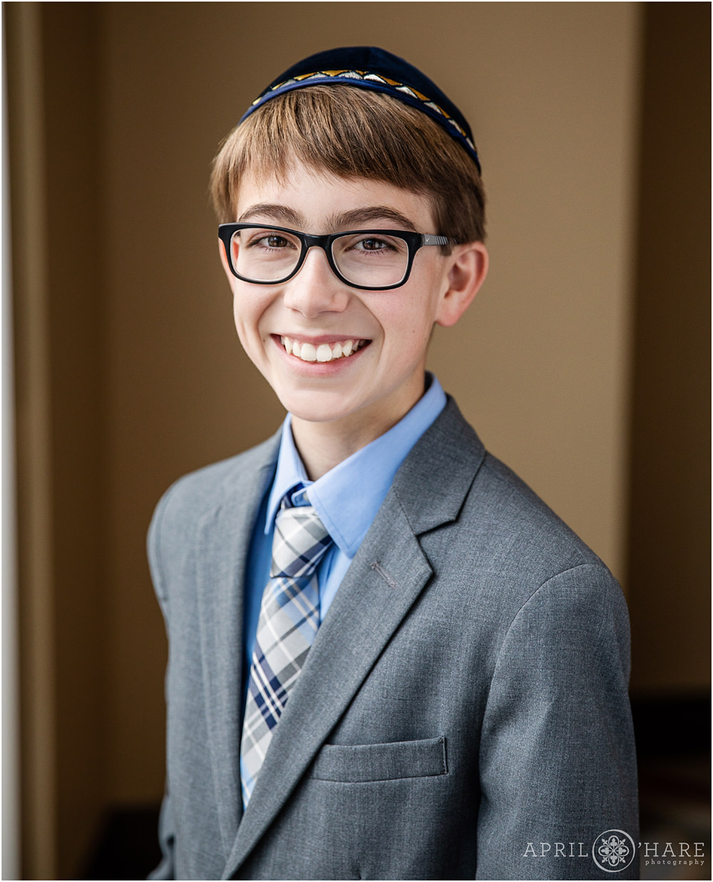 A classic nice bar mitzvah portrait with window light at the Lincoln Center in Fort Collins Colorado