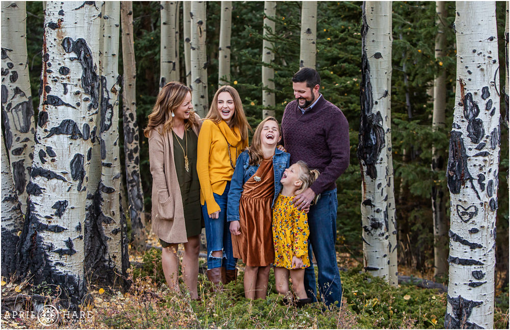 Colorado candid family photography in an aspen tree forest during fall