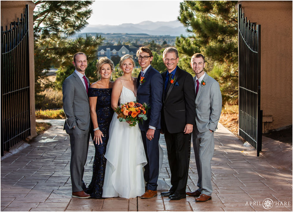 Family portrait in front of the mountain views at Villa Parker in Colorado