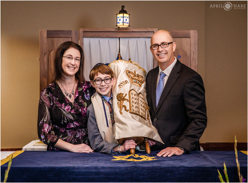 A boy with his parents on the day of his bar mitzvah at The Lincoln Center in Colorado