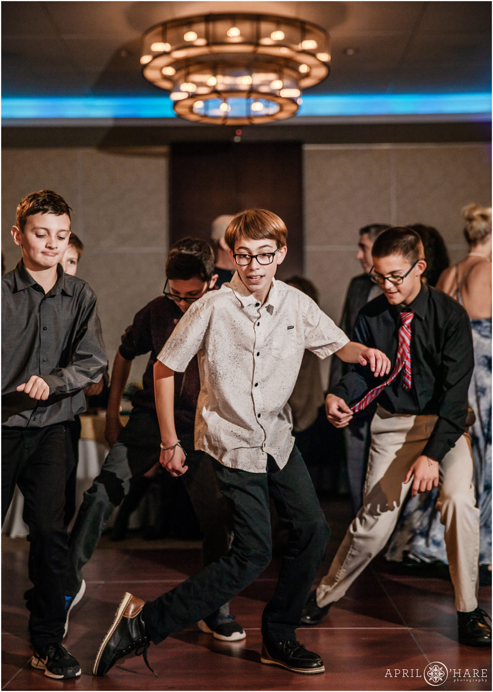 Bar Mitzvah Boy Dancing with his friends at the Lincoln Center in Fort Collins Colorado