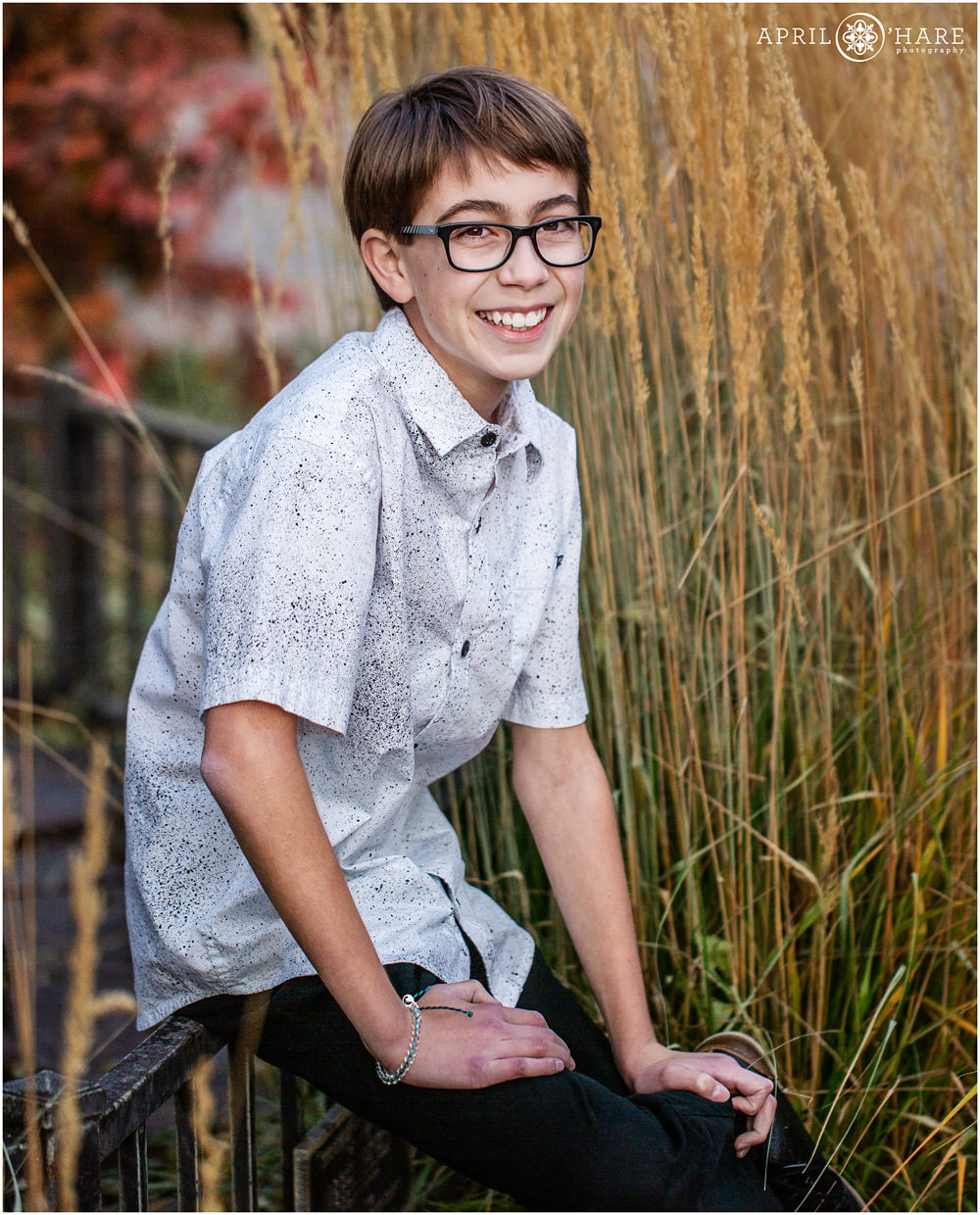 Fall color bar mitzvah portrait outside of the Lincoln Center in Fort Collins Colorado