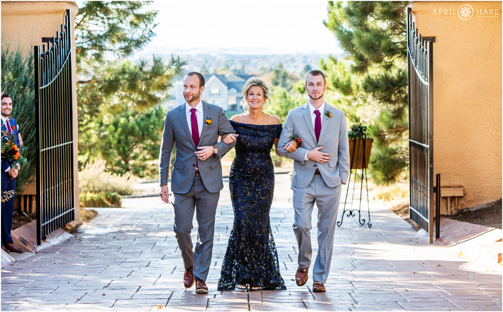 Mom and her sons walk down aisle on her daughter's wedding day at Villa Parker in Colorado