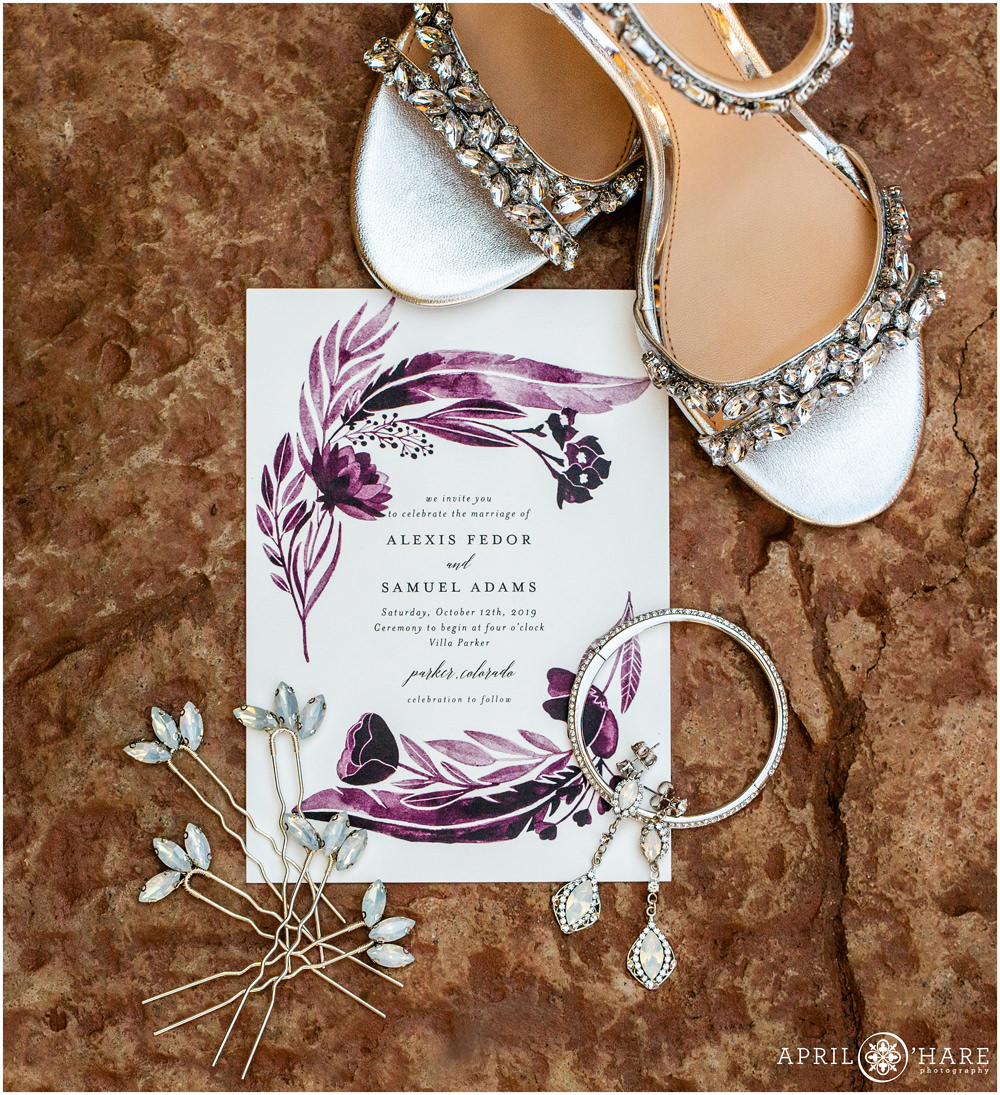 Beautiful wedding details laid out together for a fall wedding at Villa Parker in Colorado