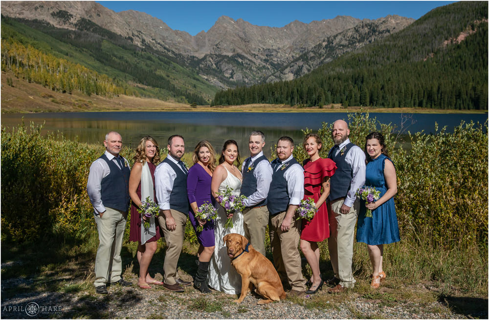 Bridal party formal picture with pretty mountain backdrop at Piney River Ranch on a sunny day