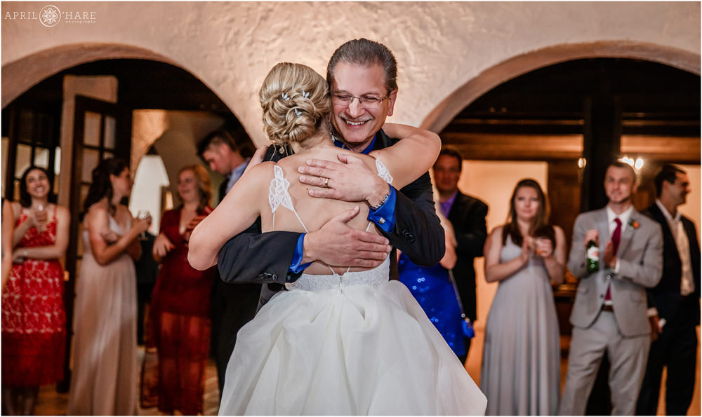 Dad hugs his daughter after their dance together at Villa Parker in Colorado