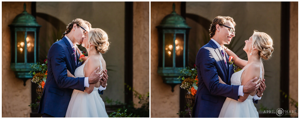 Bride and groom kiss at their outdoor wedding ceremony in the courtyard of Villa Parker