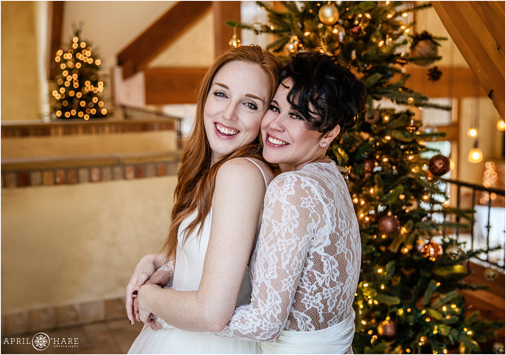 Lesbian wedding couple at their same sex Christmas wedding at Della Terra
