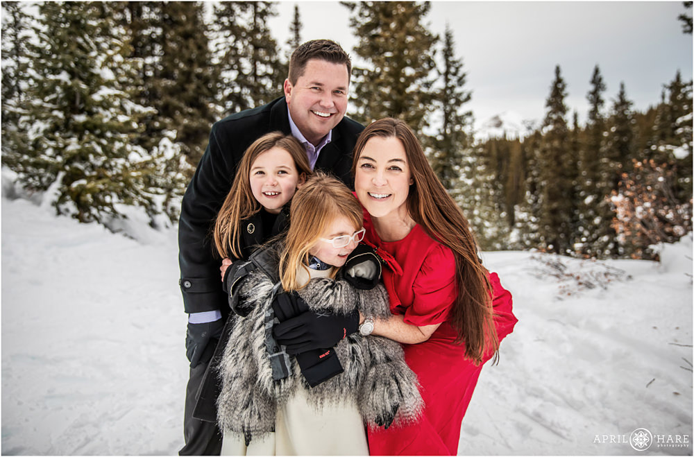 Cute candid winter family photos in Leadville Colorado at the Mayflower Gulch Trailhead