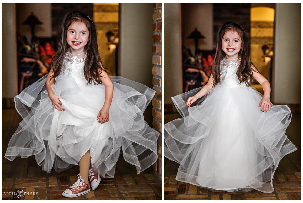 Cute flower girl shows off her sparkly sneakers at Della Terra in Estes Park