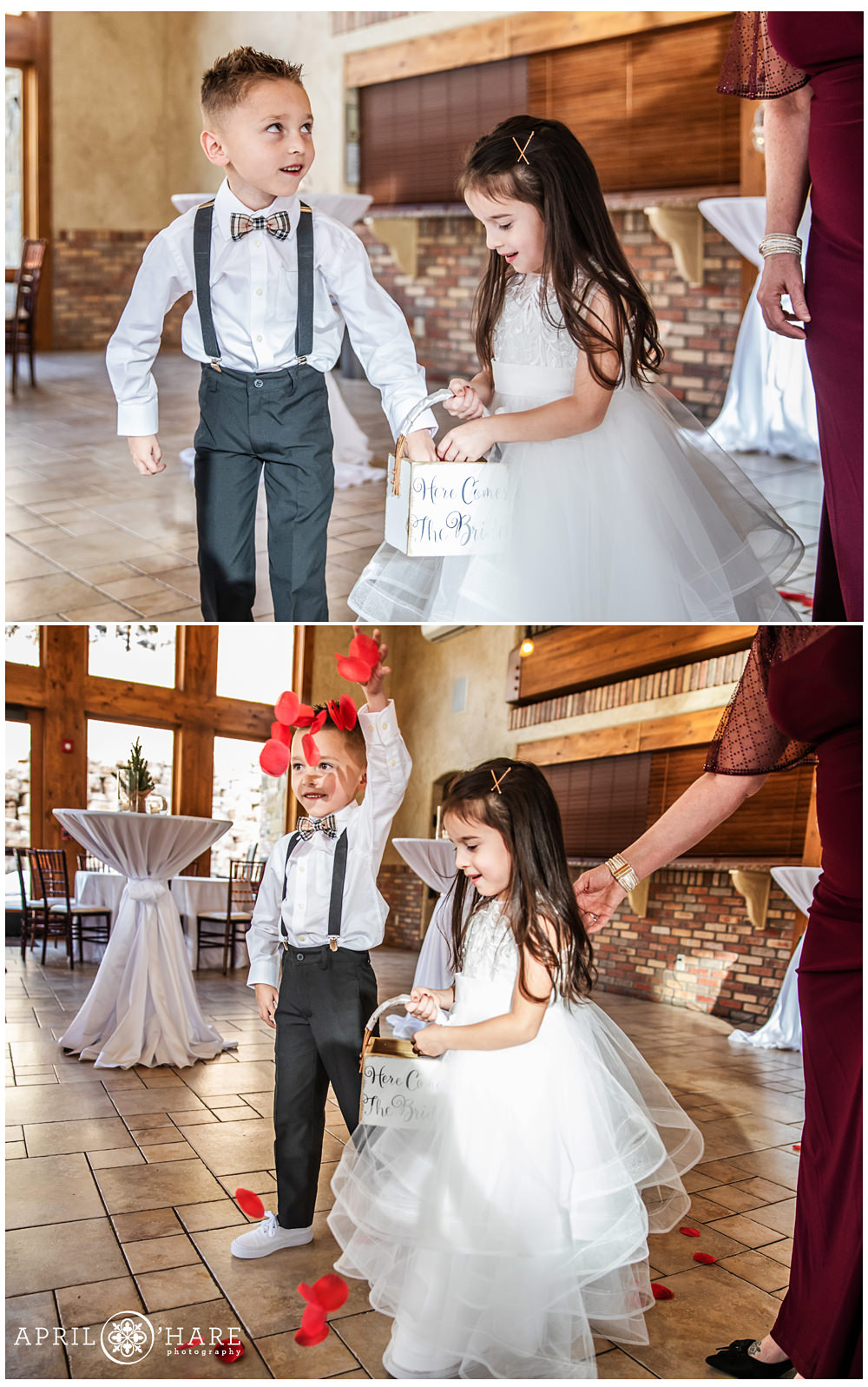 Indoor wedding throwing red rose petals flower girl and ring bearer at Della Terra