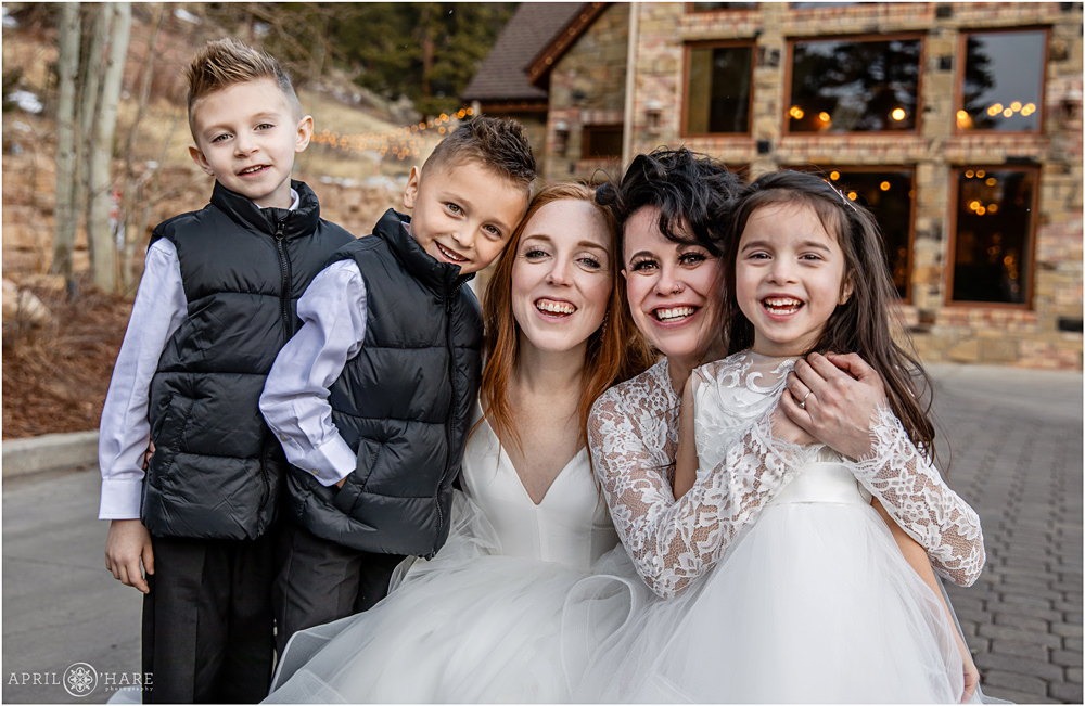 Adorable family portrait for 2 brides at their beautiful Estes Park Same Sex wedding in Colorado