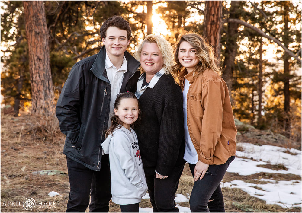 Cute Family Pictures in a Winter Forest Setting at West Mount Falcon in Colorado