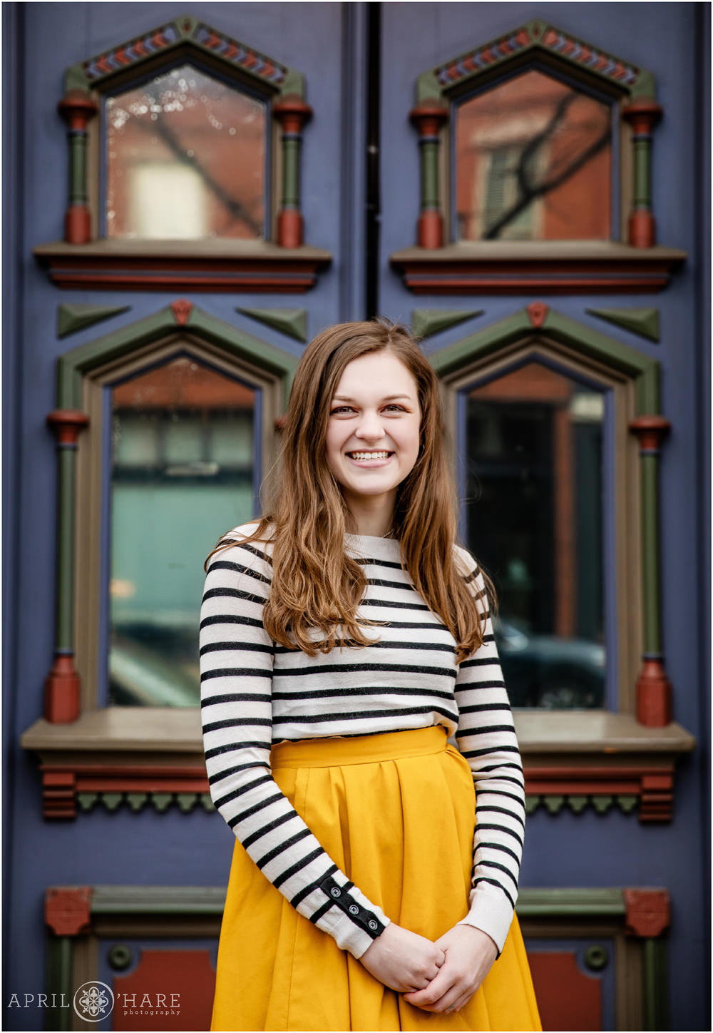 Pretty Colorful Door Backdrop at a  Denver Senior yearbook Session