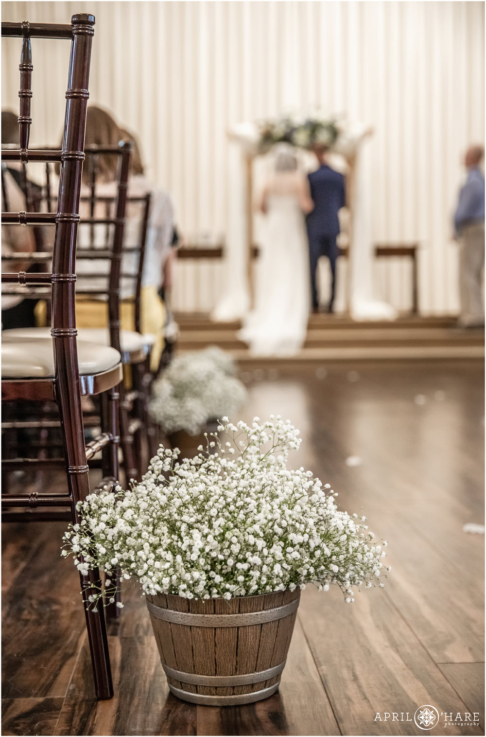 Baby's Breath decorates aisle at Indoor ceremony at Wedgewood Weddings Black Forest
