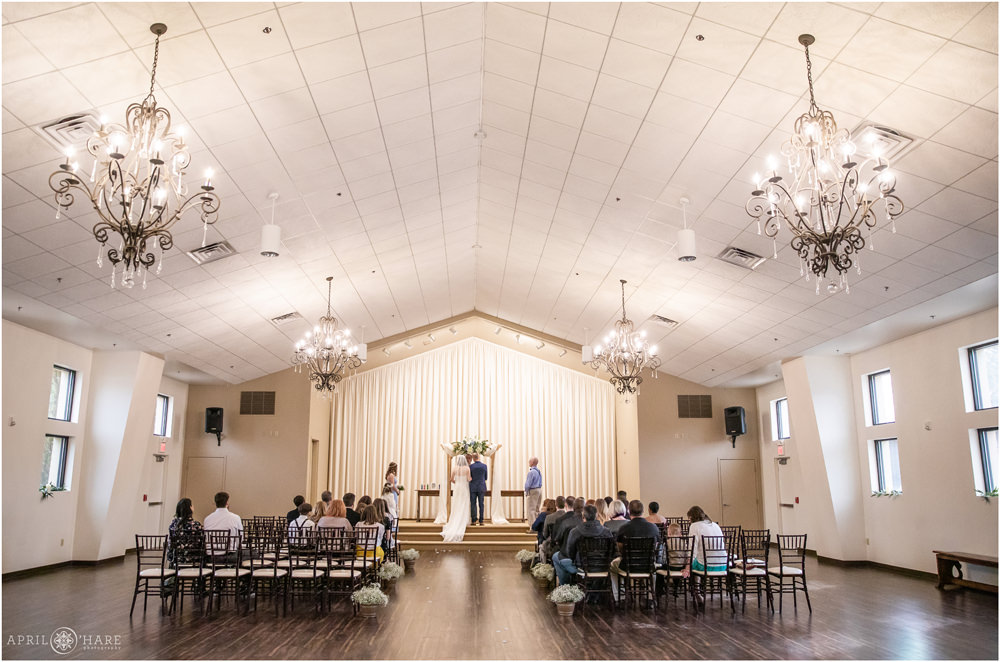 Indoor ceremony at Wedgewood Weddings Black Forest Wide Shot of Space with people seated
