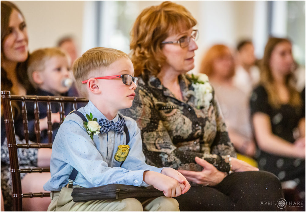 Young son watches his dad get married at Indoor ceremony at Wedgewood Weddings Black Forest