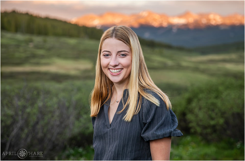 Teen girl photographed on Shrine Pass at sunset during her family's photography session in Vail