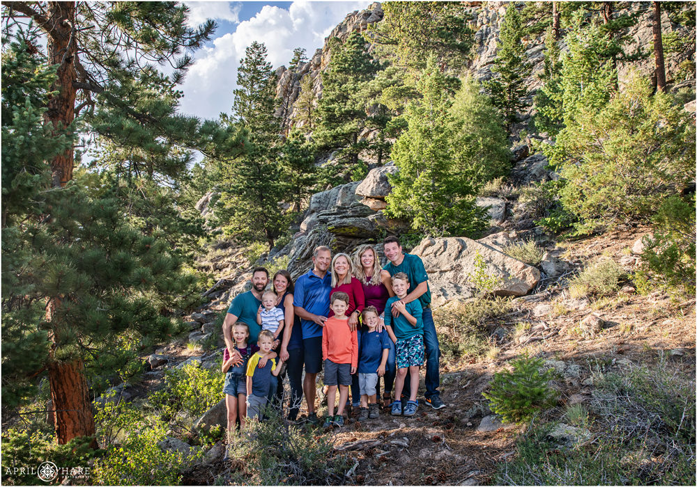 A group photo of an extended family on their mountain property in Estes Park